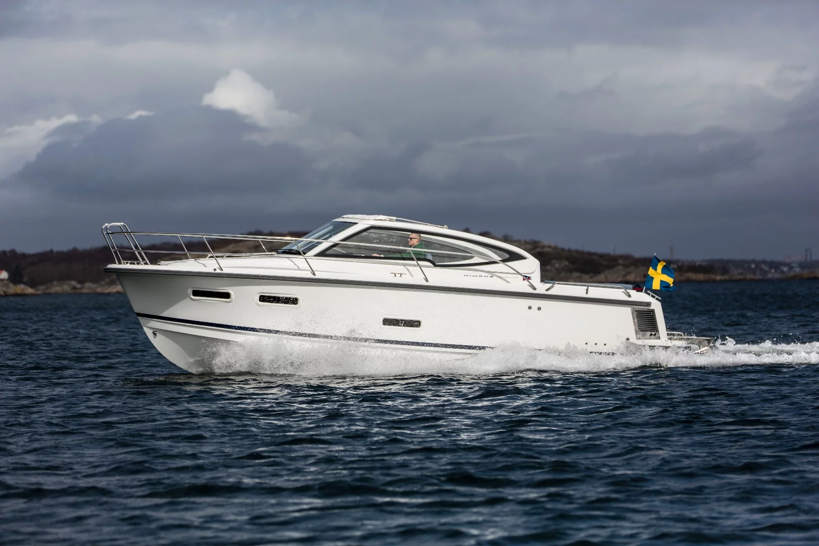 The 305 Drophead with folding fabric roof follows the hard-top 305 Coupe to market