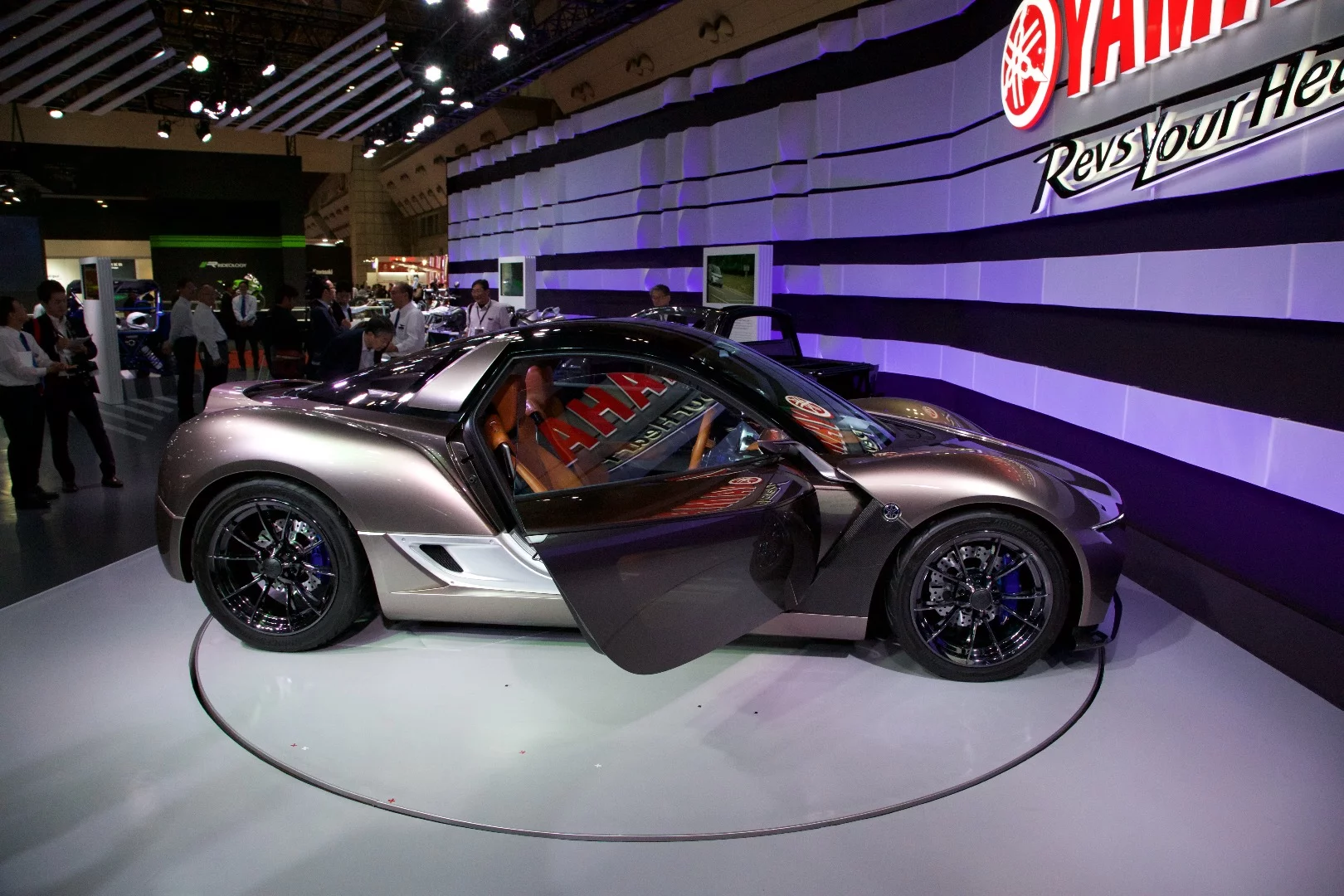 Yamaha's Sports Ride Concept attempts to convey the feeling of riding a motorcycle to a lightweight two-seater sport car