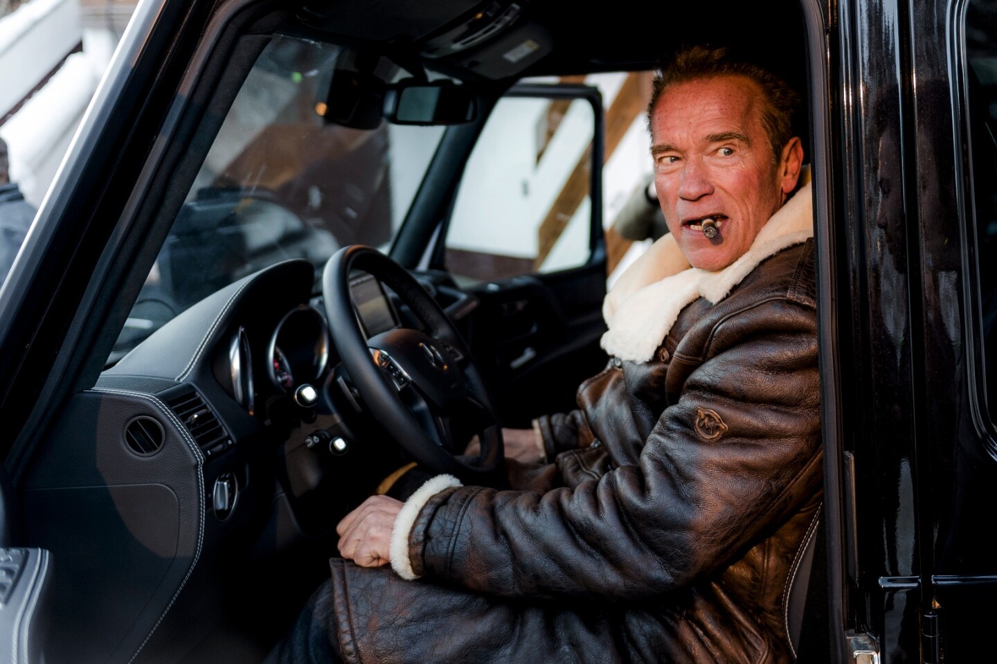 We must say: Schwarzenegger chomping a cigar in an oversized leather coat behind the wheel is a good way to advertise a rugged, off-road electric vehicle