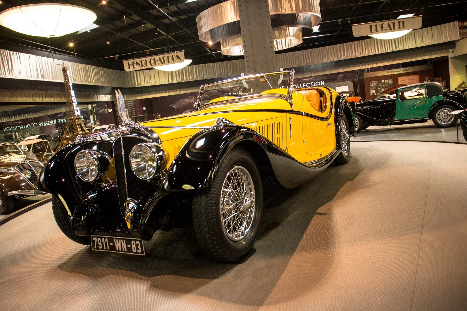 1934 Avions Voisin type C27 Grand Sport Roadster, originally built for the Shah of Iran: "Voisin was a company that, like Bugatti, did a lot of their stuff in-house. This car here is a rare example of a Voisin that was coach-built. It was built by Figoni and Felacci, and it was originally built for the Shah of Iran."