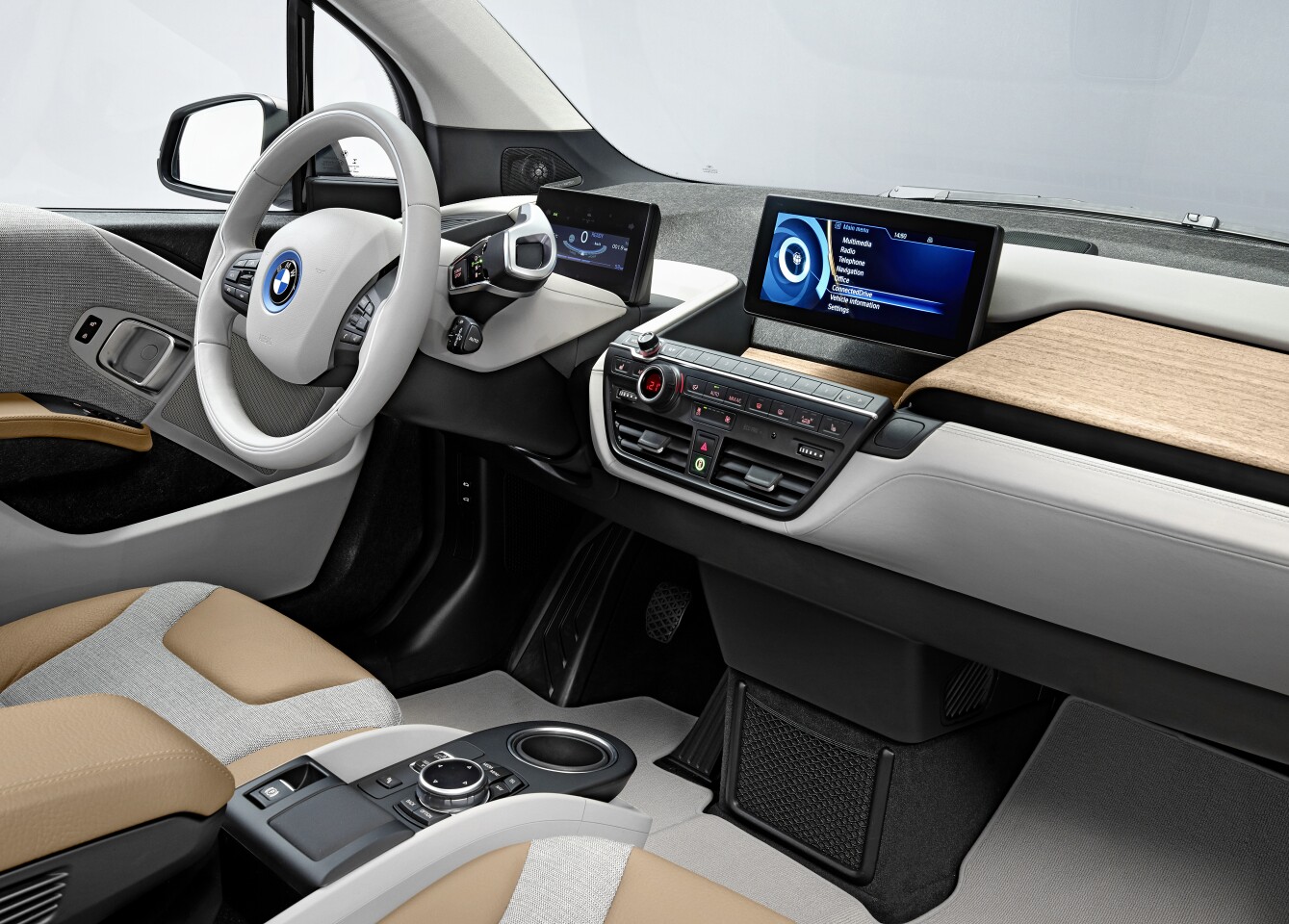 The i3 interior uses a variety of sustainable materials, including the eucalyptus wood on the dash