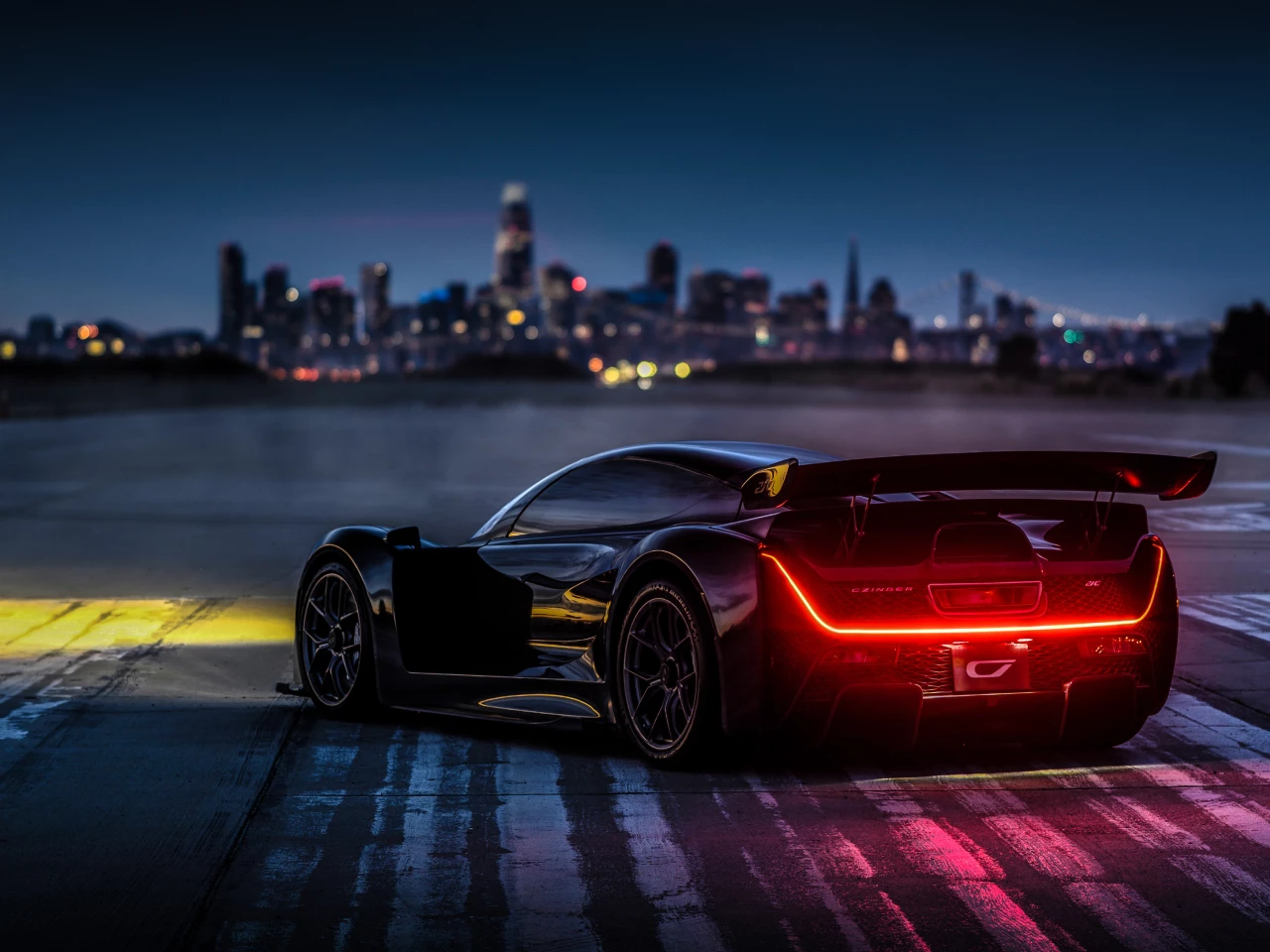 This tandem hypercar is built on a 3D-printed, robot-assembled frame