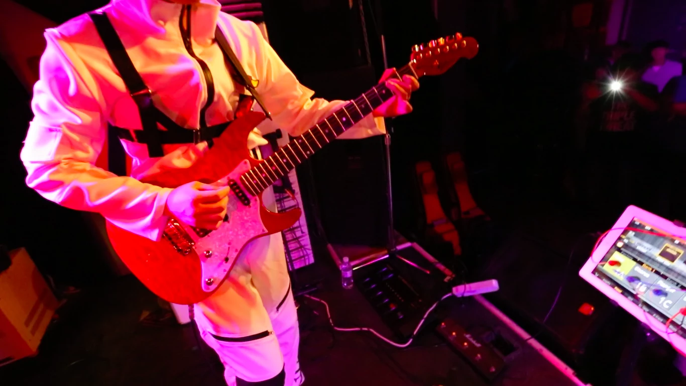 The RemoFinger system allows musicians to activate tablet-based digital effects without taking playing hands away from a guitar