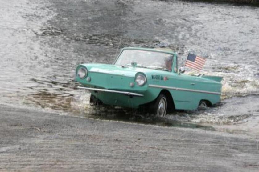This 1964 Amphicar has a Fjord Green exterior, white convertible top and an Apricot interior. This Amphicar, to the best of the seller's knowledge, has clocked 6,000 original miles from new, and the seller believes that he is the fourth owner. The car will go to auction by Russo & Steele at Scottsdale during January 2015.