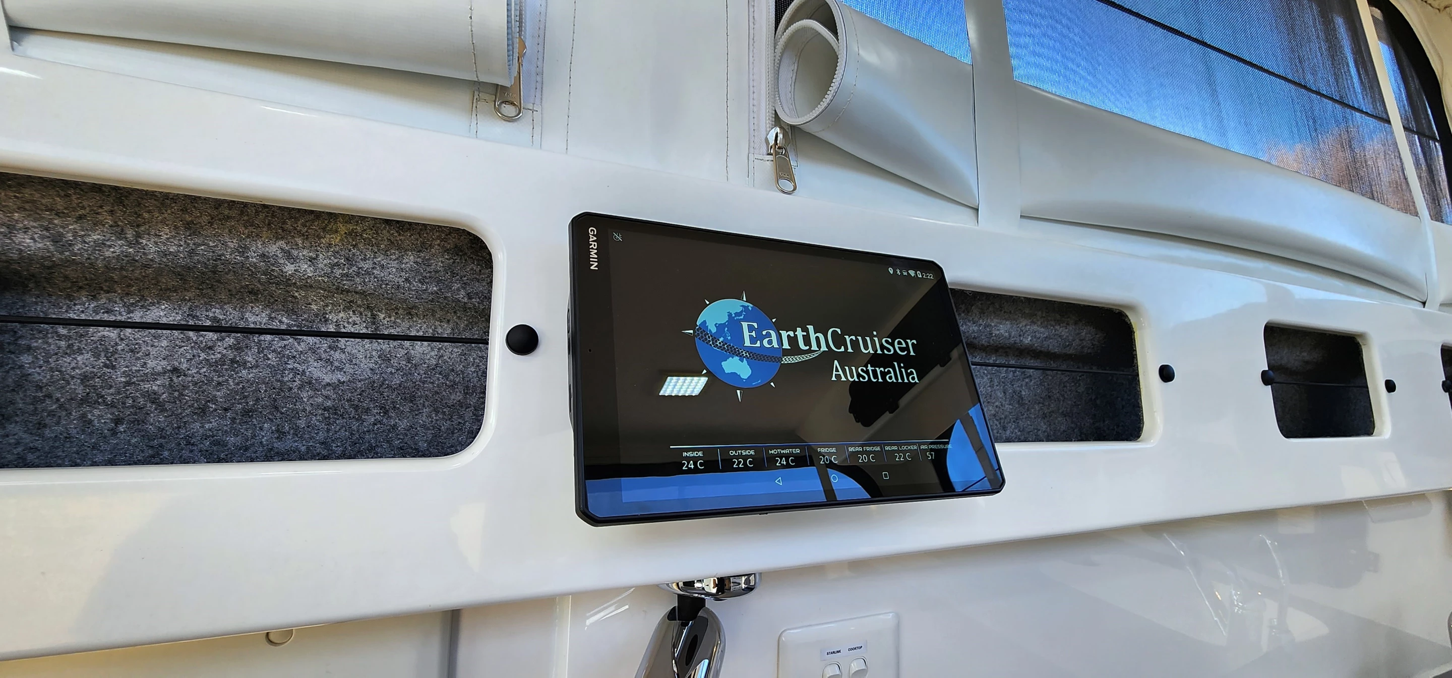 EarthCruiser offers smart home-like control with three Garmin touchscreen command centers, including the one in the cab