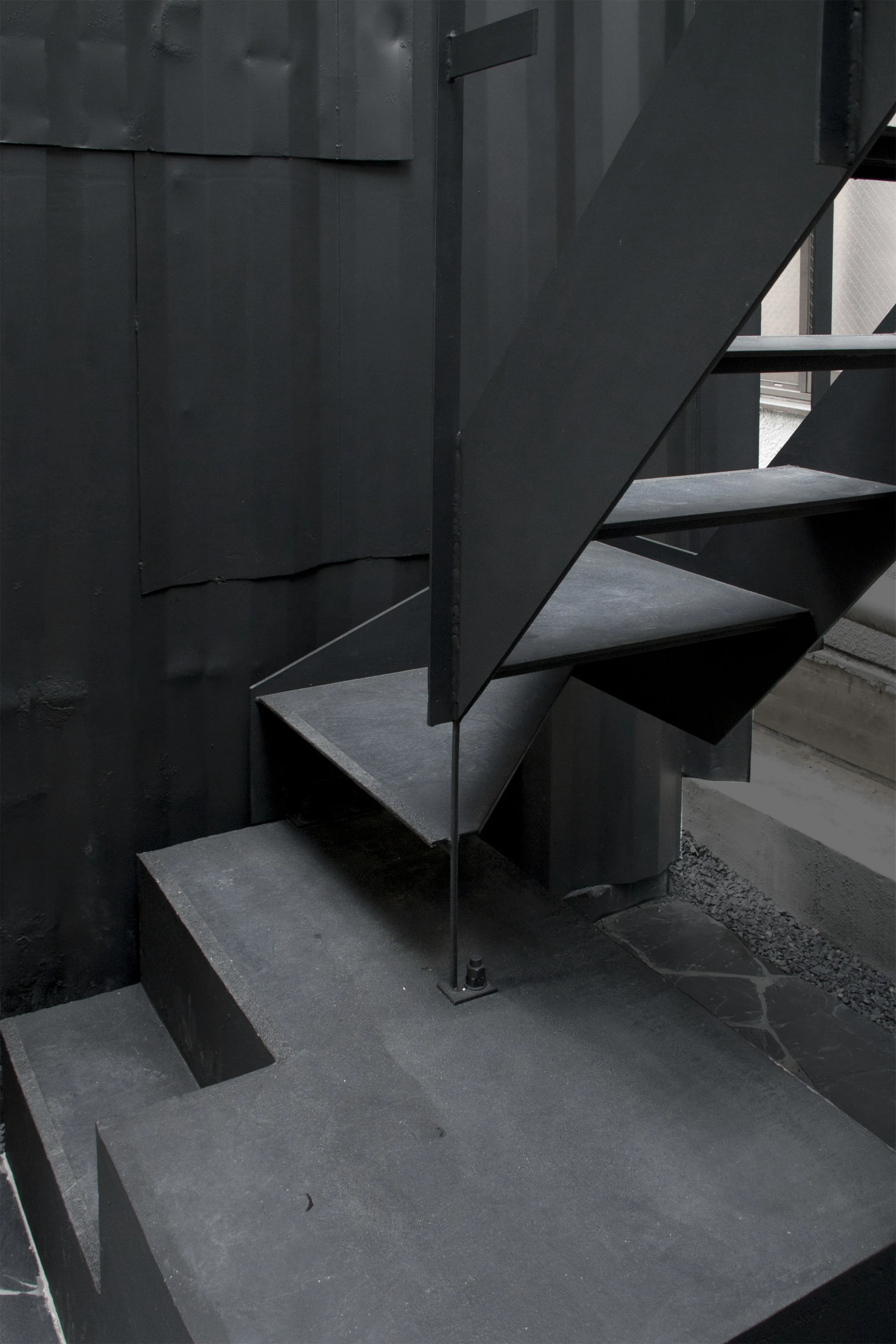 Steel staircase leads the way to the upper level