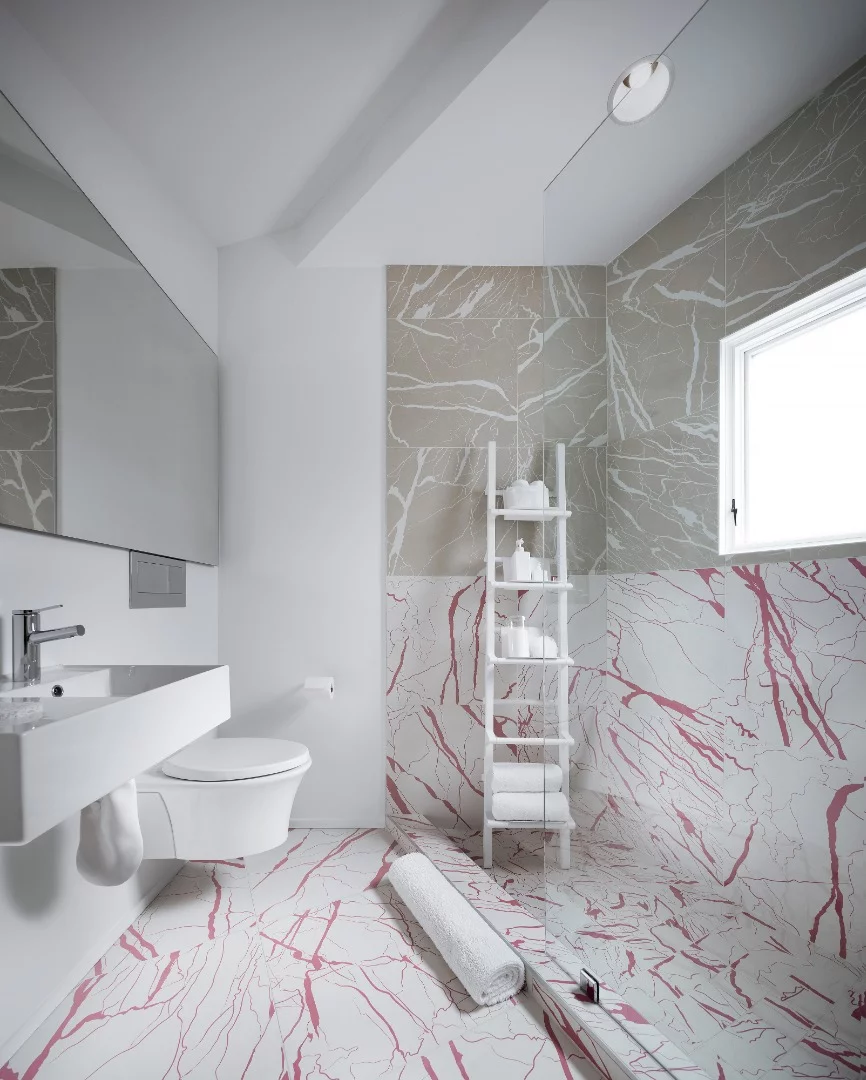 Faux marble tile finishes in the bathrooms