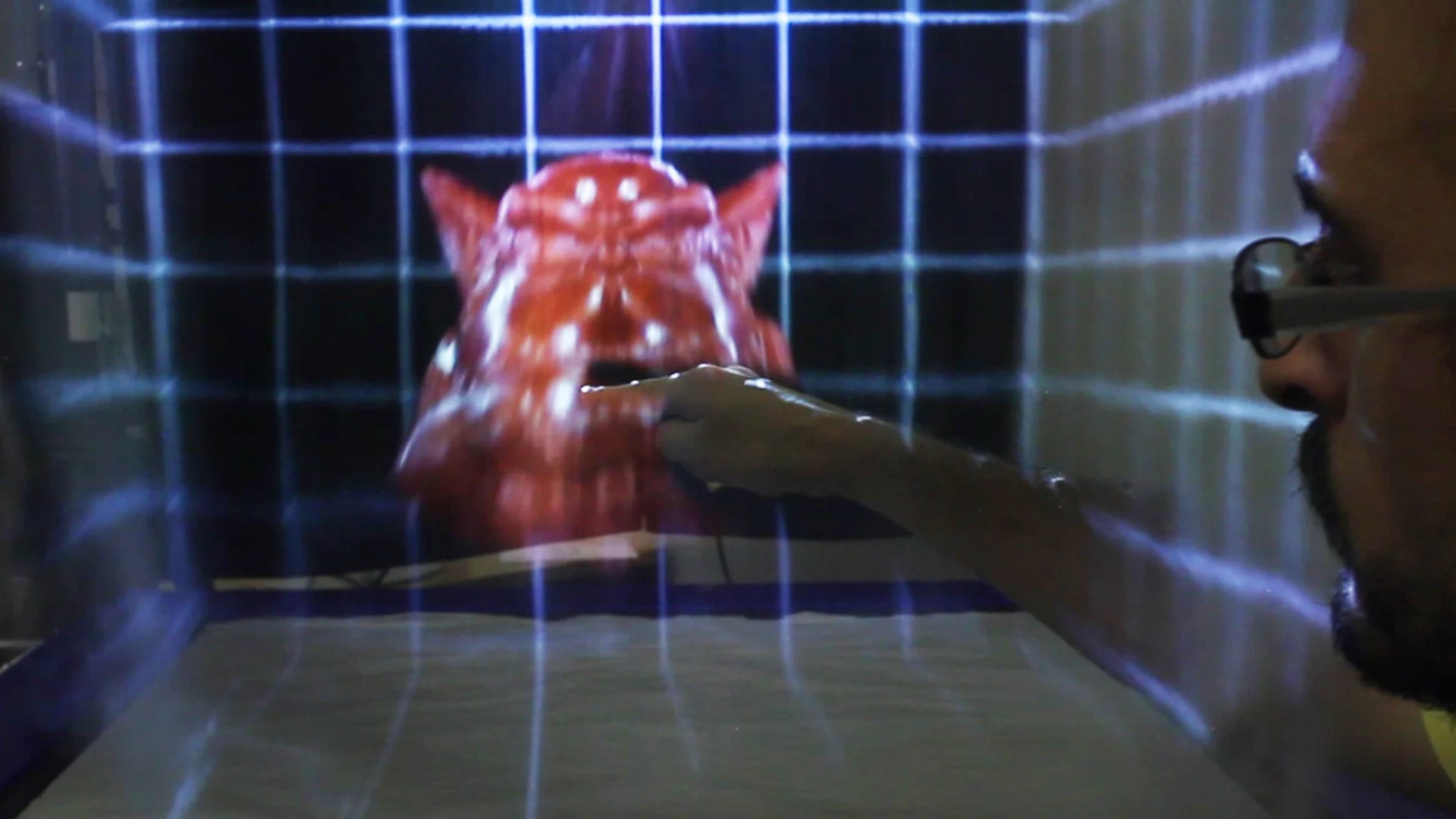 The MisTable allows 3D fog screen images to be manipulated with gestures (Photo: Bristol Interaction and Graphics group, University of Bristol, copyright © 2014)