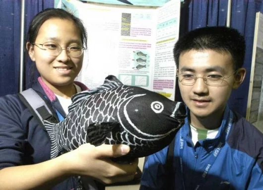 Xing Lu and Chang Liu, both 18, from Wuhan, China, with their project, a Bionic Robofish - a robot that is helping explore new underwater navigation techniques