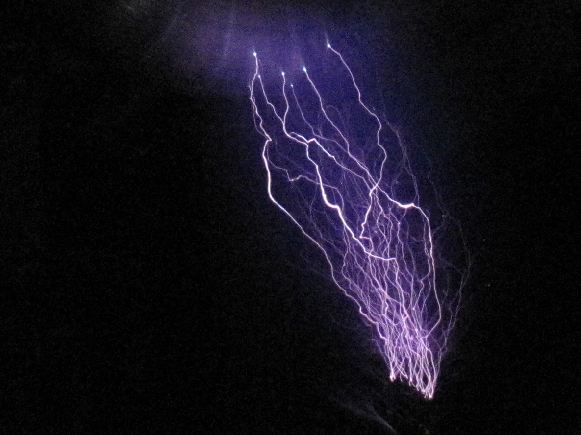 When a spike is added to the top of the toroid, the sparks fly straight out at anything up to two feet