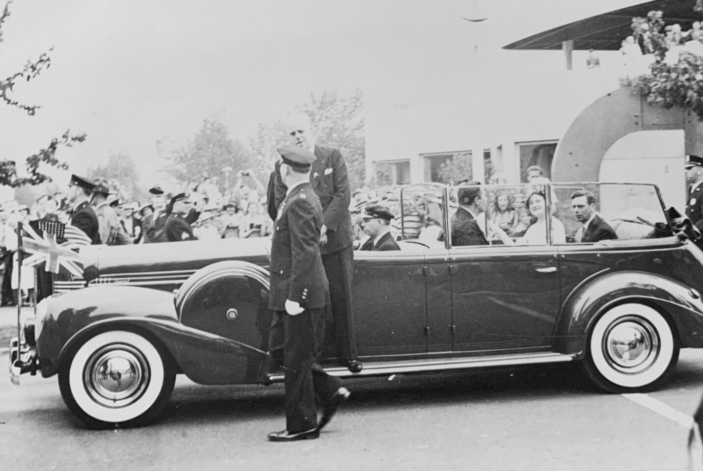 $162,400 | 1939 Chrysler Custom Imperial Parade Phaeton by Derham | Auction House: RM-Sotheby’s King George VI and Queen Elizabeth during their visit to New York World’s Fair. Note the addition of bullet proof glass and rear-facing jump seats.