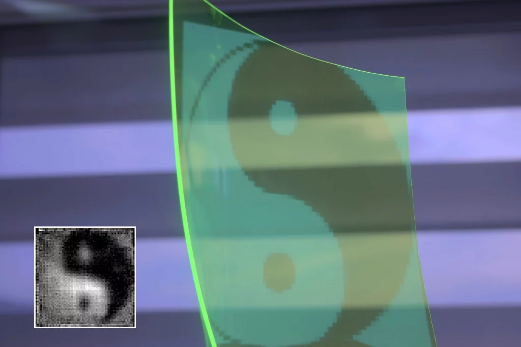 A comparison between the image being focused on the sensor surface and (inset) the reconstructed image (Photo: Oliver Bimber, Johannes Kepler University Linz)