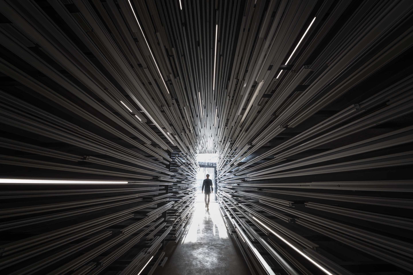 MoMa's interior is accessed by an aluminum-lined tunnel