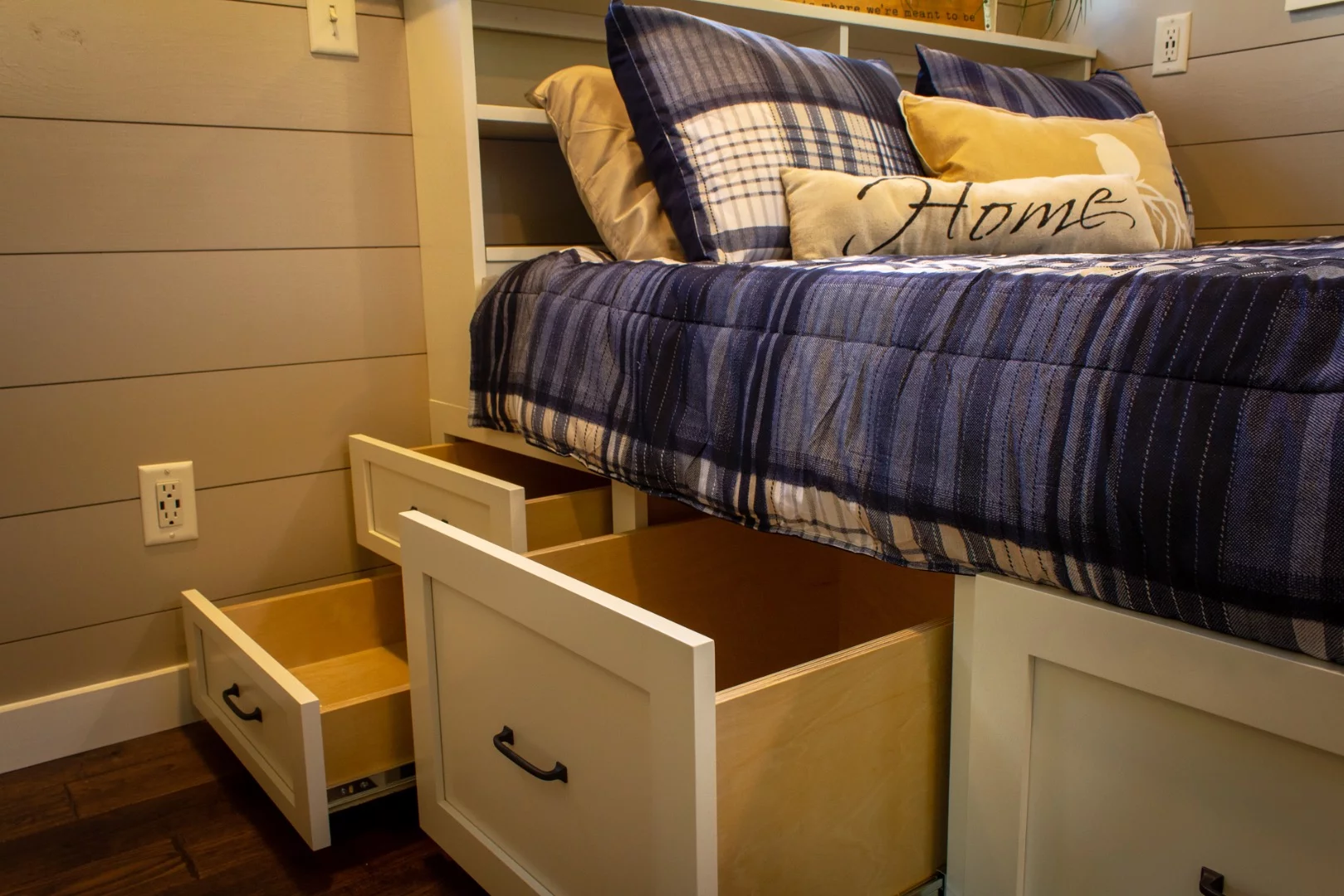 The Cedar House's bedroom has integrated storage space