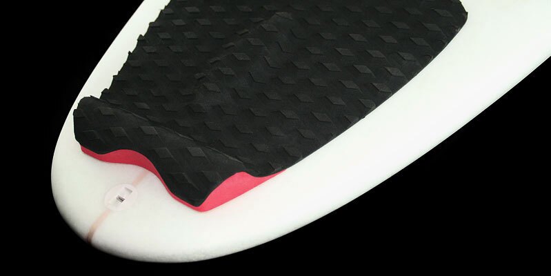 A traction surface on a surf board, made from the foam
