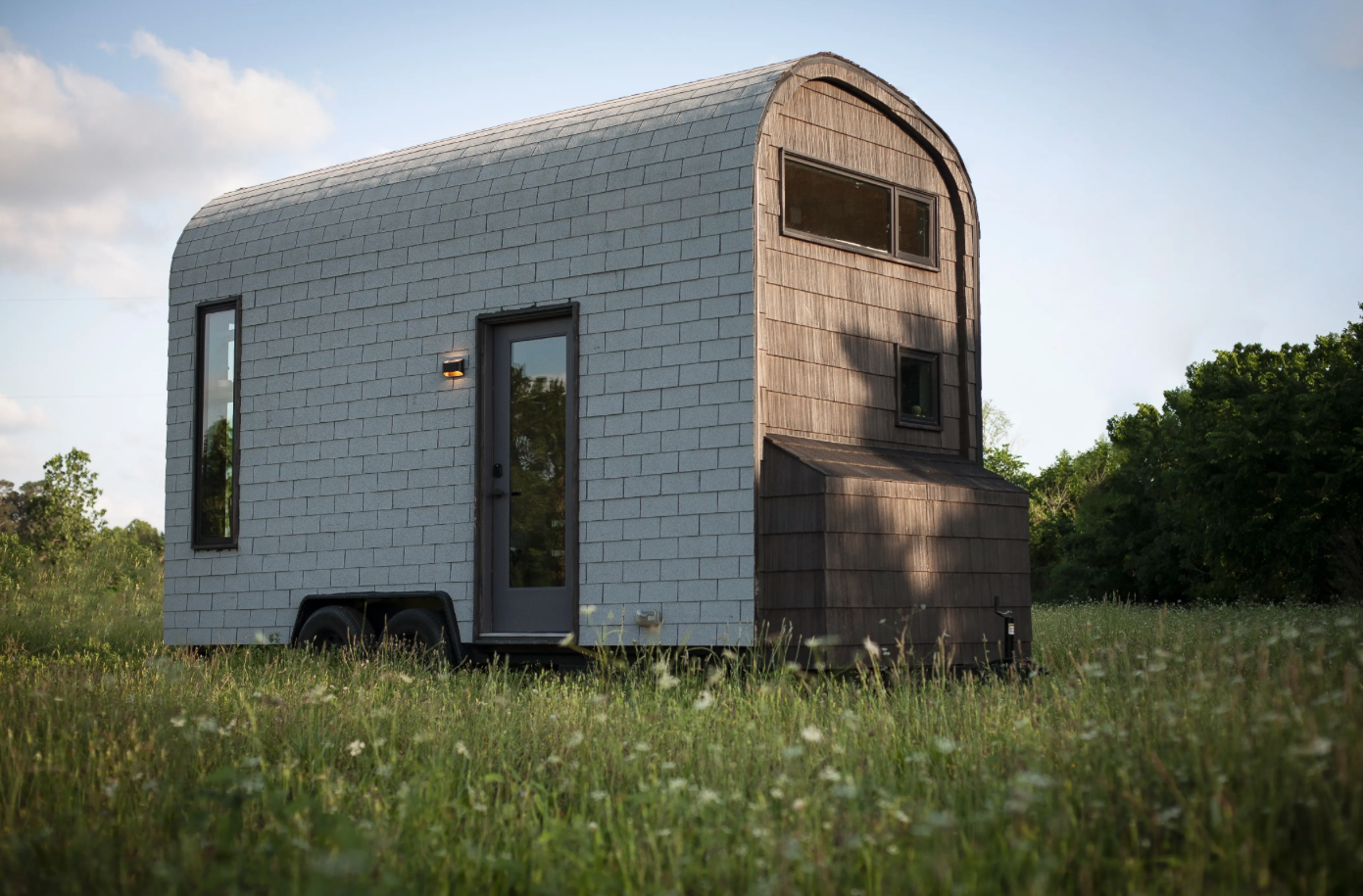 The S'Mouse City Model is an eye-catching tiny house that resembles a modern take on an old-fashioned shepherd's hut