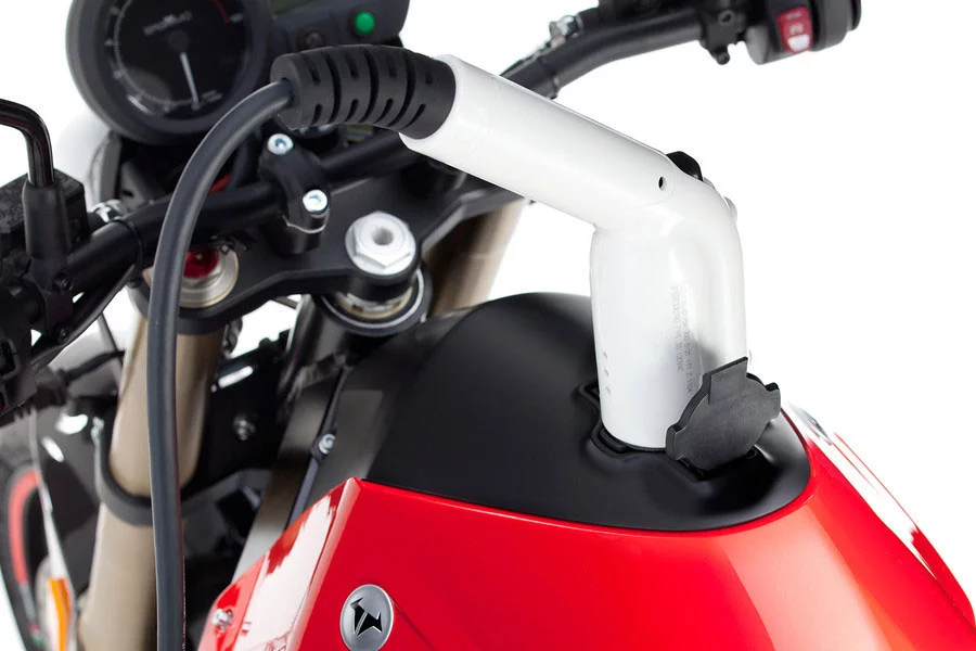 Brammo Empulse charges in 8 hours using a conventional outlet.