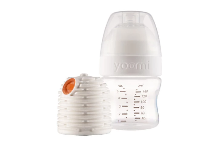 The Yoomi bottle heats milk in about a minute