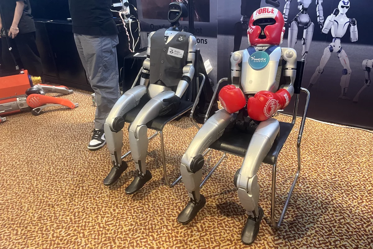 Not every robot spent the expo performing demonstrations. Some spent it sitting in chairs contemplating their future