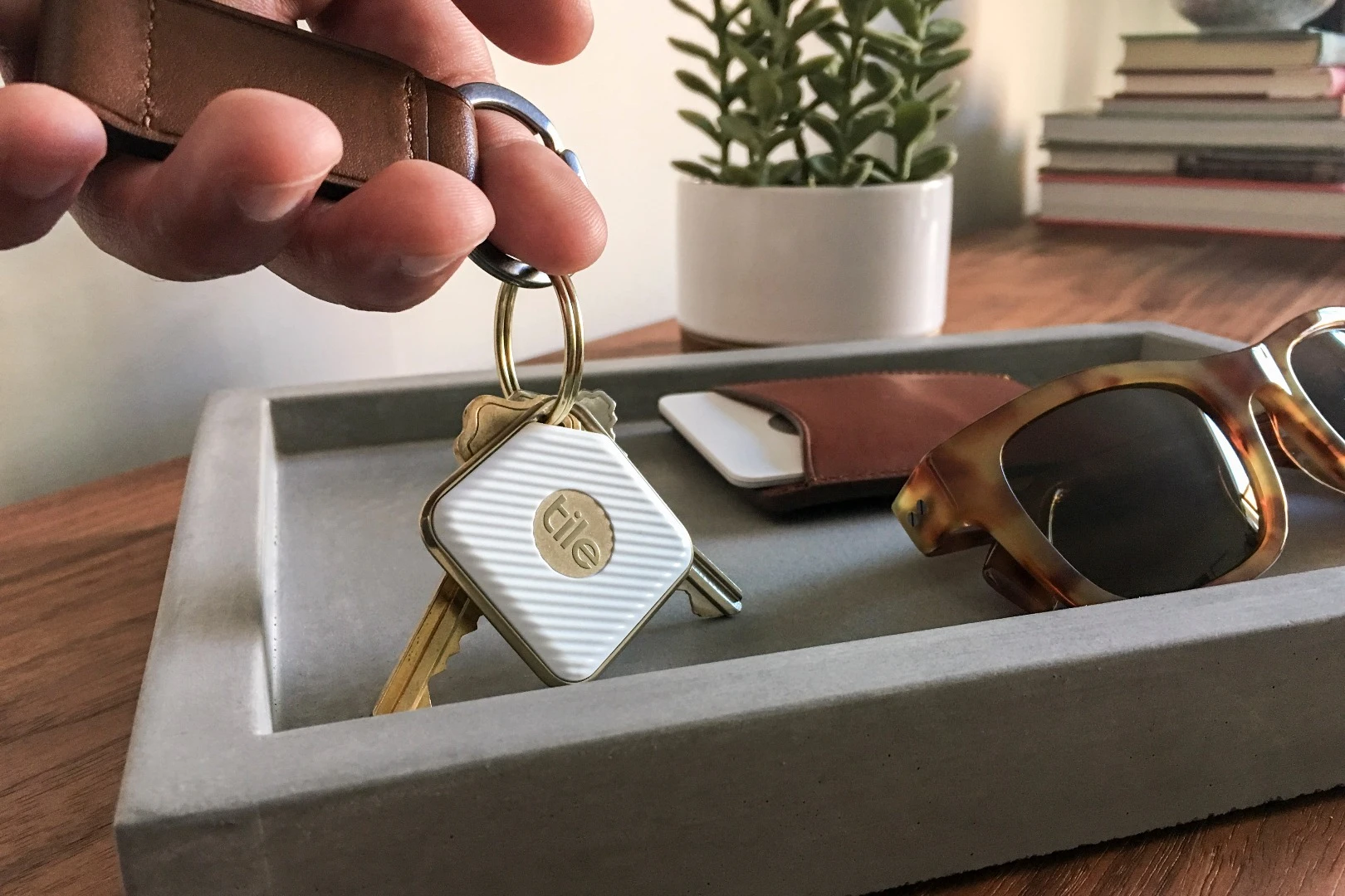 Tile is basically a Bluetooth-connected square that can be latched onto key, wallets or anything else prone to misplacement