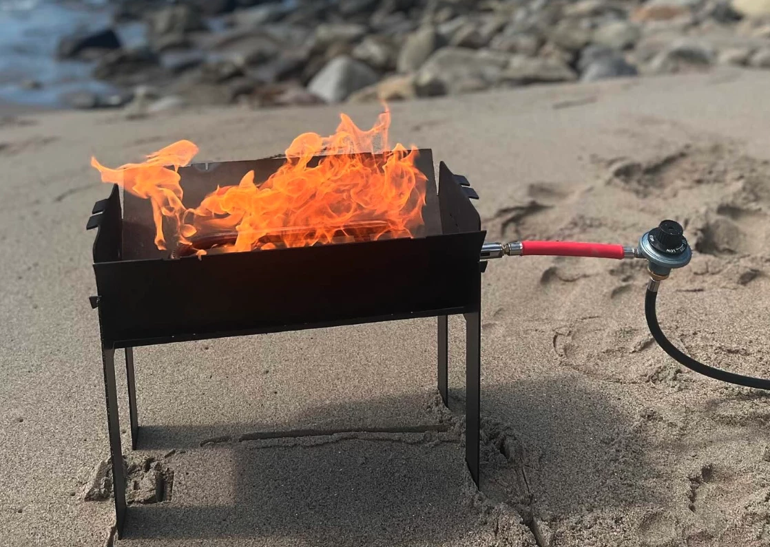 After dinner, use the Grill Game G1 as a roaring fire pit ... a safer alternative to a wood fiire