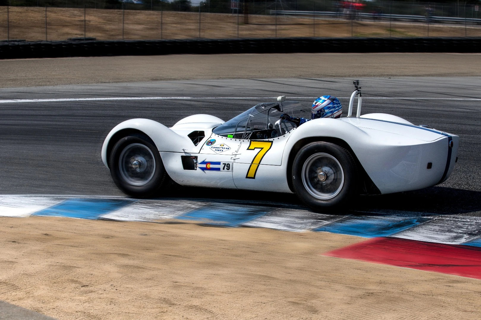 1960 Maserati Tipo 61 9, aka the Birdcage, cutting the curb on Turn 11