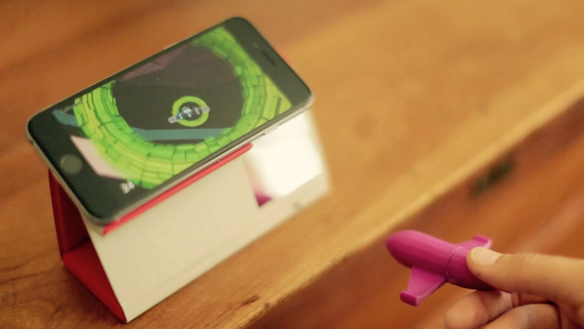 One game on the Oak app lets players fly a real spaceship through a changing virtual world