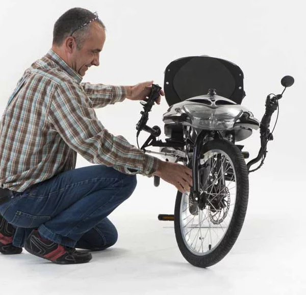 The joystick steers the front wheels via a hard mechanical connection