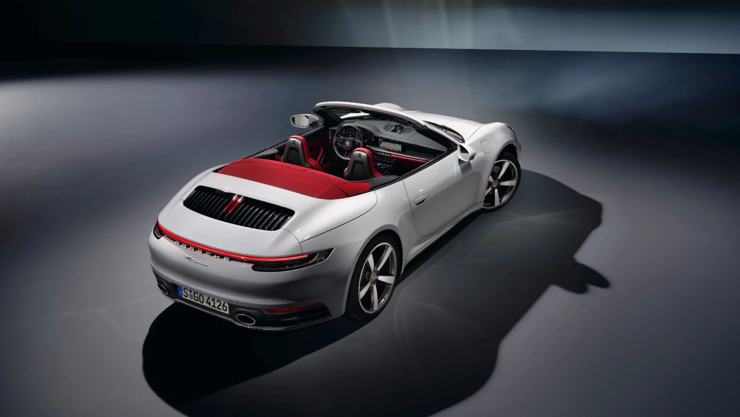The Cabriolet is a little heavier, and thus slower, than the Carrera