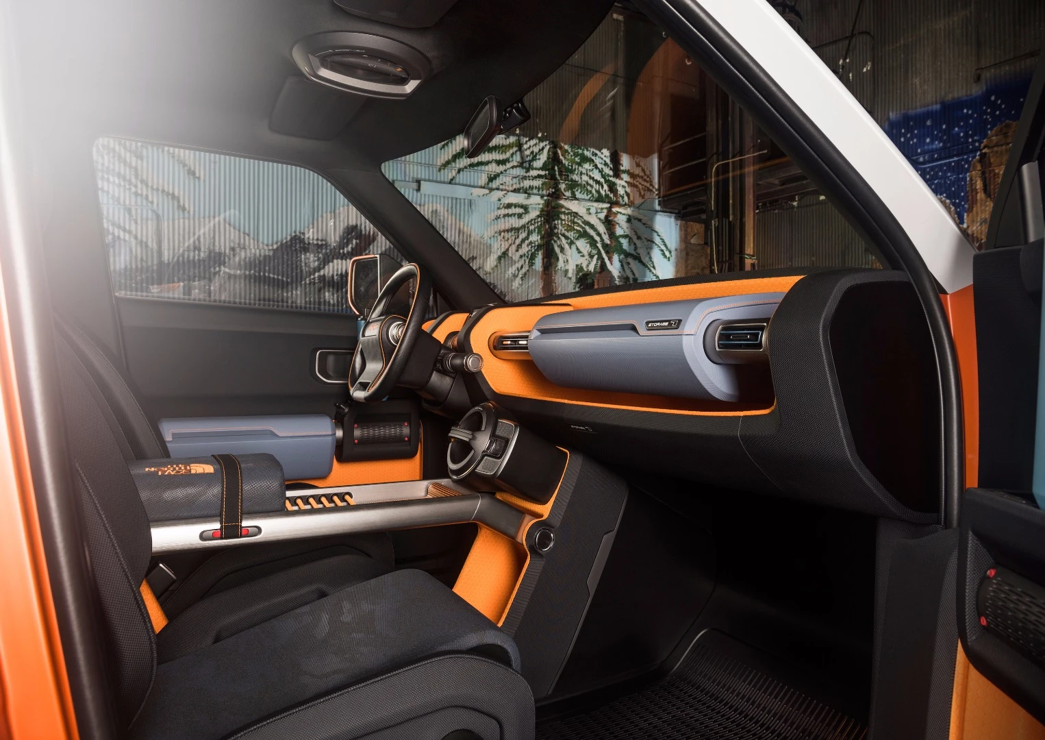 Vents to either side of the "glove box" storage bin in the Toytoa FT-4X Concept can rotate up or down to dry clothing or hair