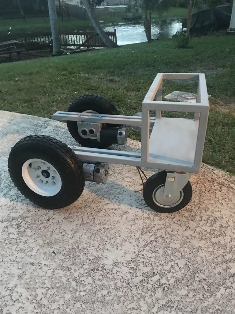 The first iteration of the Aircraft Tug has two 13-inch wheels driven by wheelchair motors