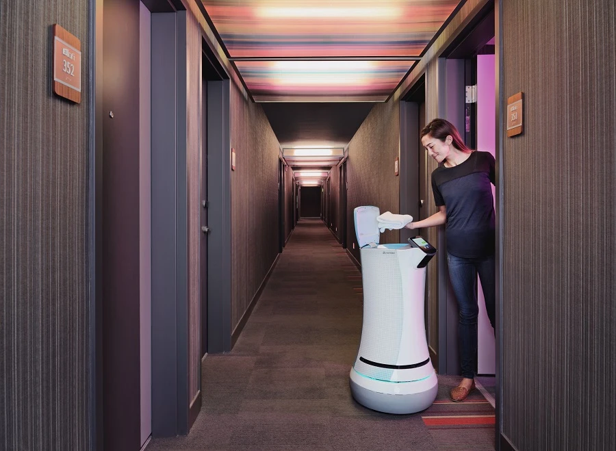 The SaviOne robot can deliver items to guests in hotel rooms