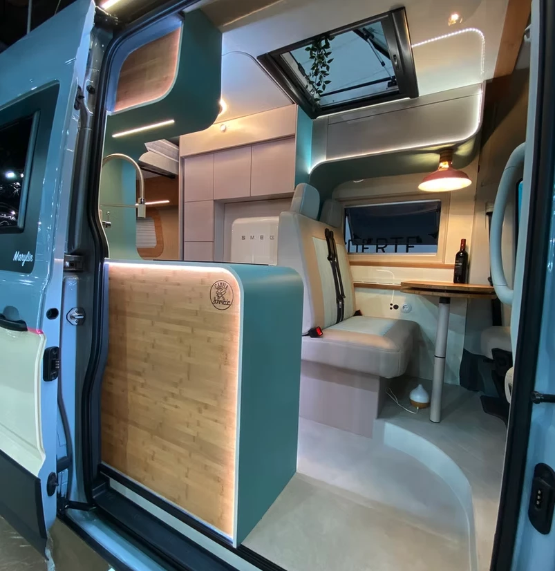 Camper Schmiede installs a real concrete floor that features a concrete veneer atop a laminate underside