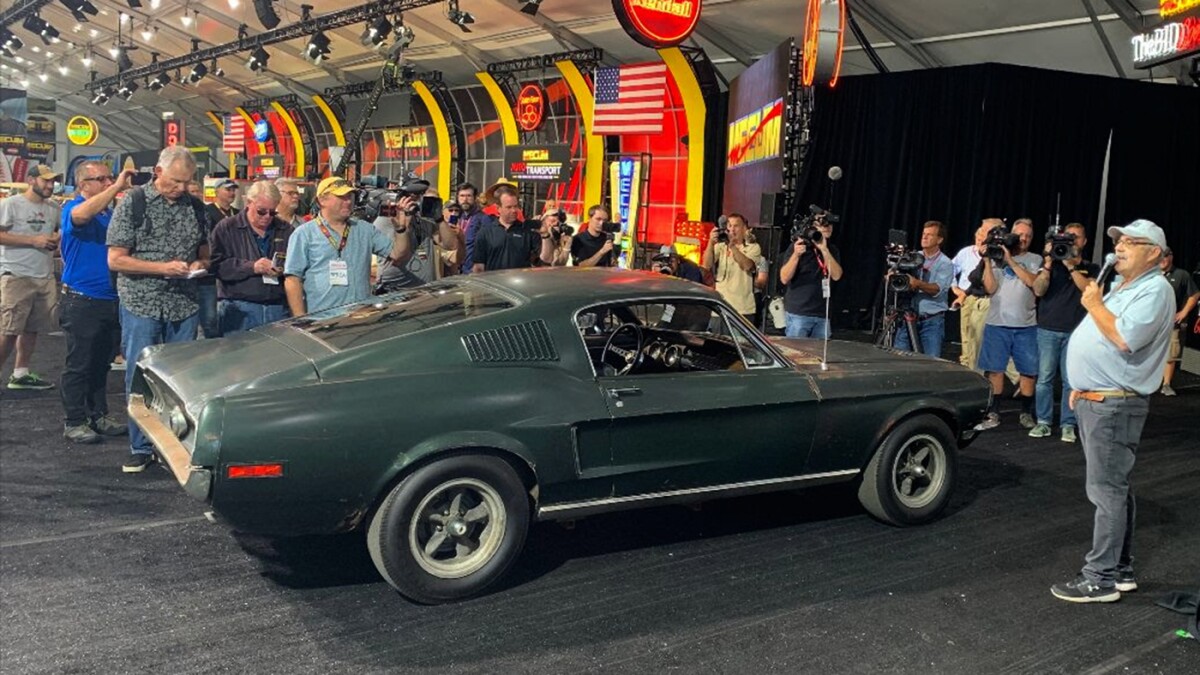 Mecum founder and President Dana Mecum (with microphone) during the announcement of the auction of the car at Mecum's Monterey 2019 auction earlier today