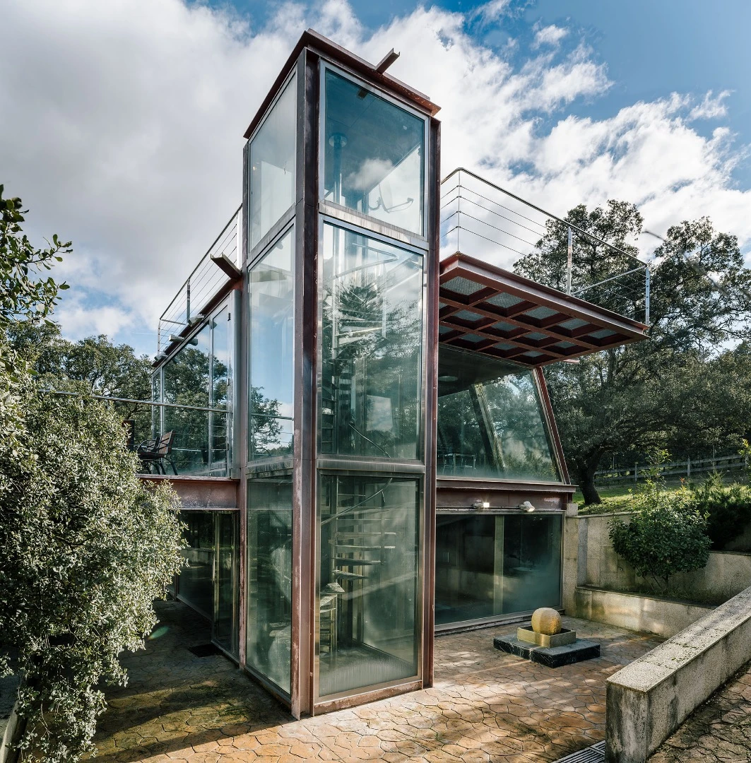 A spiral staircase provides access to the Hidden Pavilion's second floor and rooftop terrace areas