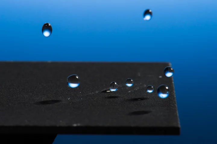 A new laser-based technique renders metal super-hydrophobic without the need for a chemical coating (Photo: J Adam Fenster/University of Rochester)