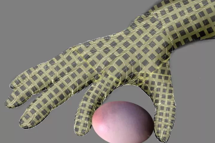 An artist's impression of an artificial hand covered with the e-skin