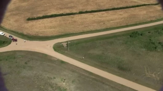 A still from the camera just before it landed, the recovery team can be seen to the left