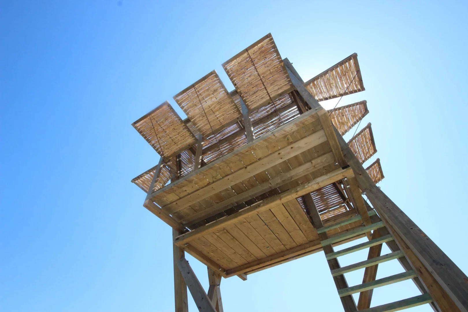 Access to the Tragata's interior is gained by steps and its walls and roof are made from panels weaved together using reeds that were found in abundance on-site