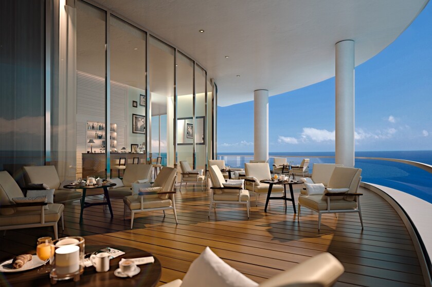 The private club at the Ritz-Carlton Residences in Sunny Isles Beach has a terrace overlooking the downtown area and the ocean