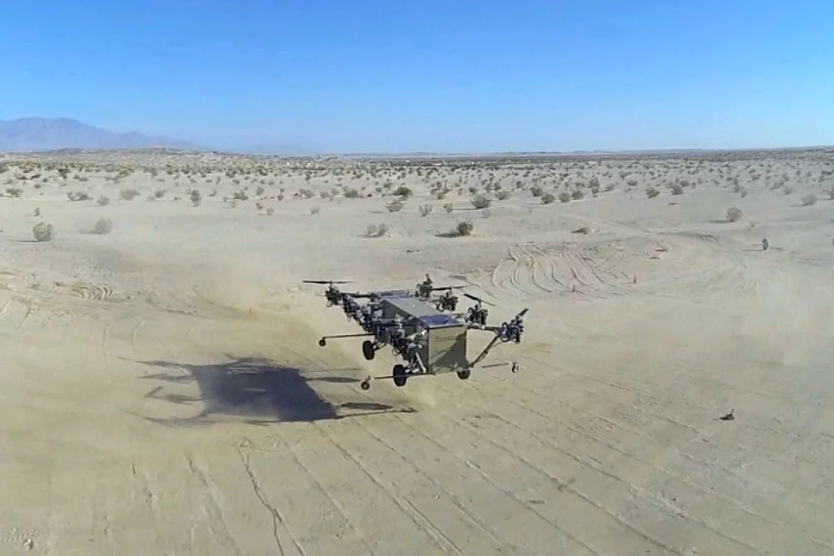 Snapshot from aerial footage of the aircraft in hover filmed by a quadcopter drone