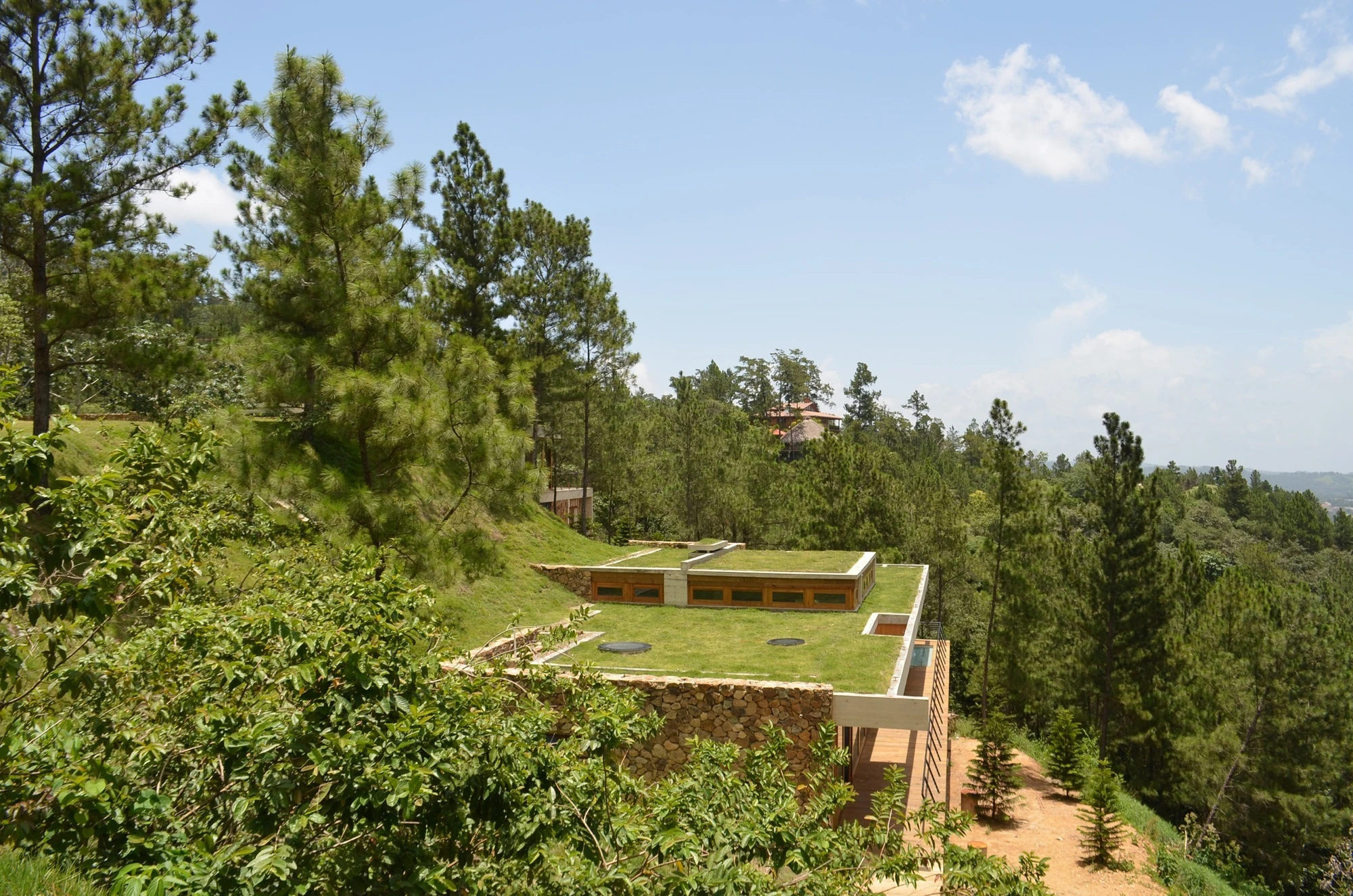Architectural firm Vasho made use of the same principles seen in a pit house while building the RD House partly into a steep hillside (Photo: Eduardo Abreu)