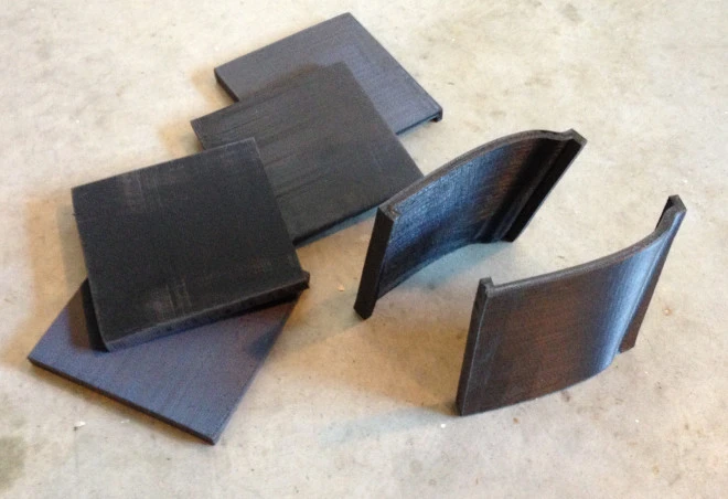 3D sections, averaging 105 mm x 105 mm (4 in x 4 in), are printed en masse, then glued to frames, forming the basic design (Photo: Ivan Sentch)