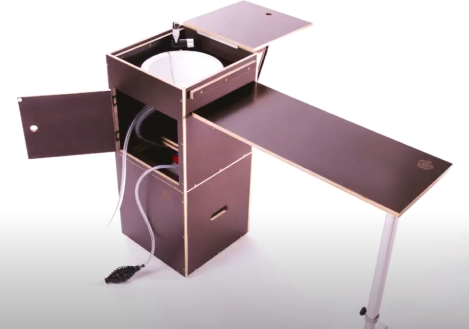 The top of the sink box becomes a worktop, and a sleeping platform panel becomes the table