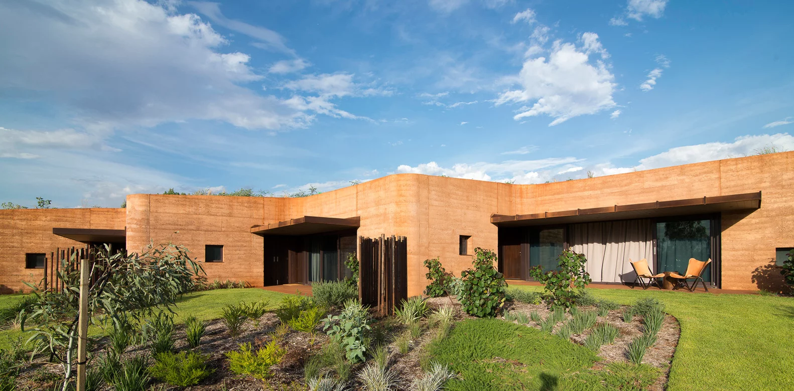 Called The Great Wall of WA, this giant rammed earth structure houses 12 apartments cleverly embedded into the natural landscape keeping the internal spaces cool in the hot Western Australian environment