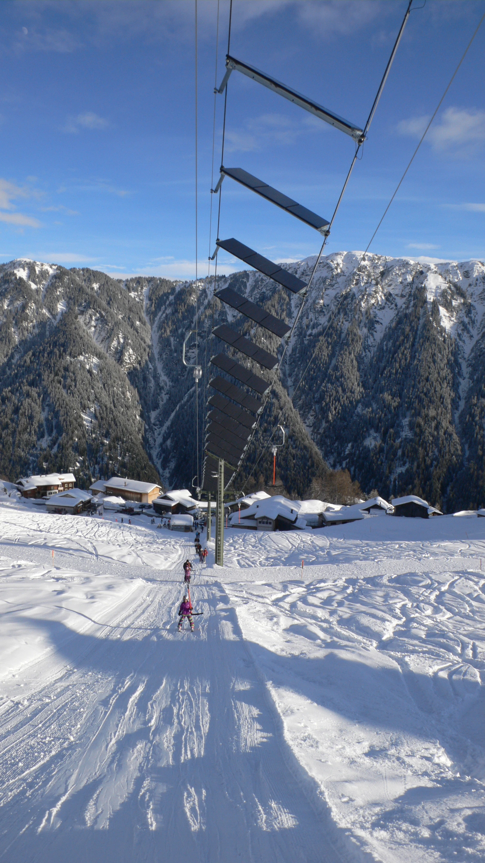 The solar lift is one of the world's first of its kind and utilizes a "cable car system" where the solar panels are integrated directly into the ski lift