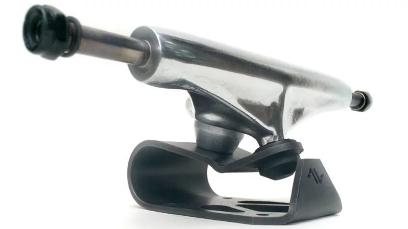 Avenue Trucks utilize a simple leaf spring-like design, where the magnesium main body of the truck is mounted on a folded-over metal baseplate