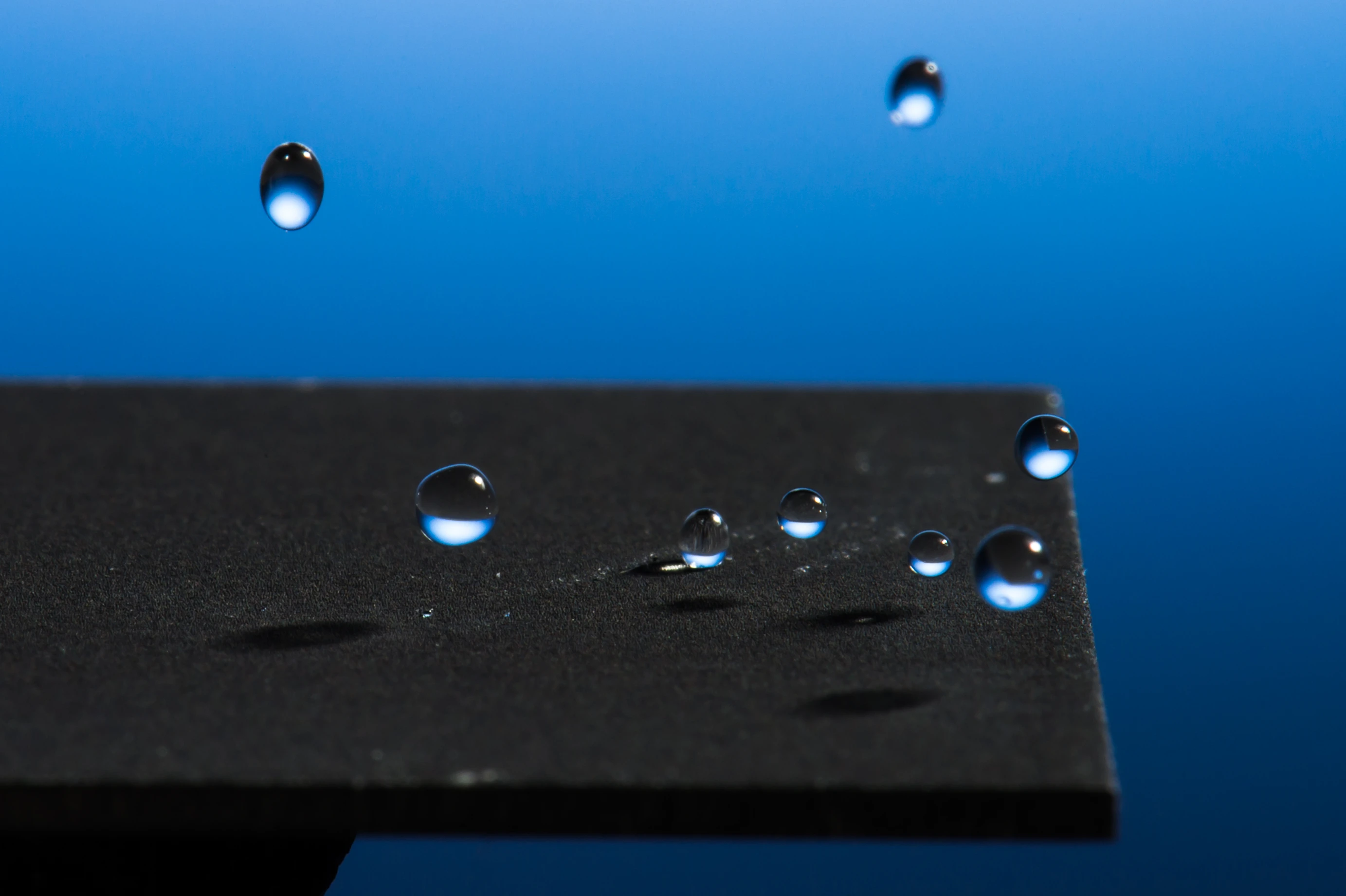 A new laser-based technique renders metal super-hydrophobic without the need for a chemical coating (Photo: J Adam Fenster/University of Rochester)