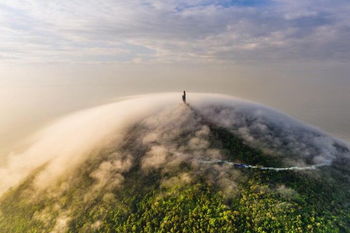 Highest Mountain in the South of Vietnam, by Tran Tuan Viet, captures the stunning Ba Den Mountain. At its summit stands a huge Bodhisattva statue
