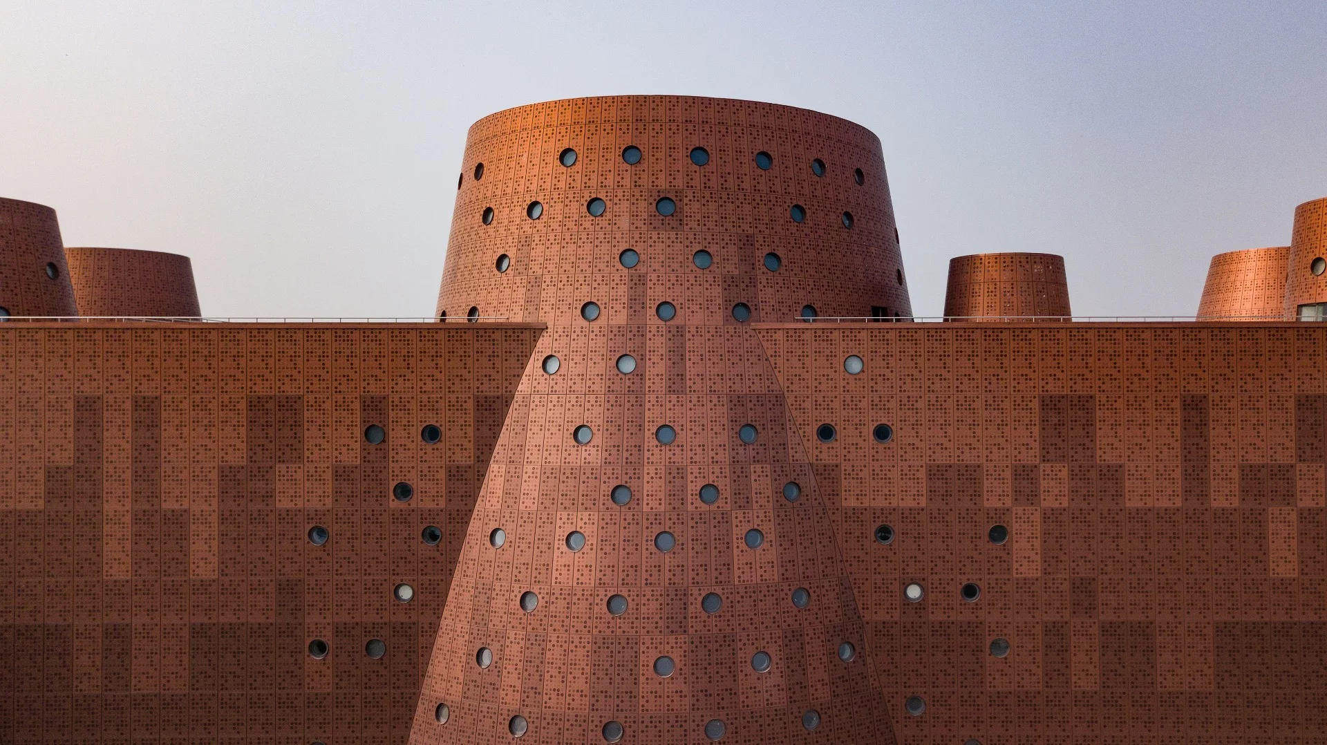 The Exploratorium's facade includes many perforations and porthole-like windows